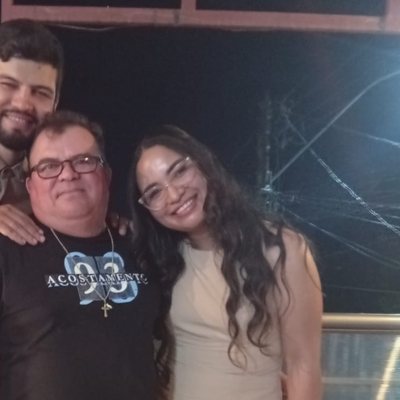 Ana Paula, ao lado do pai e do irmão na festa de 70 anos dele